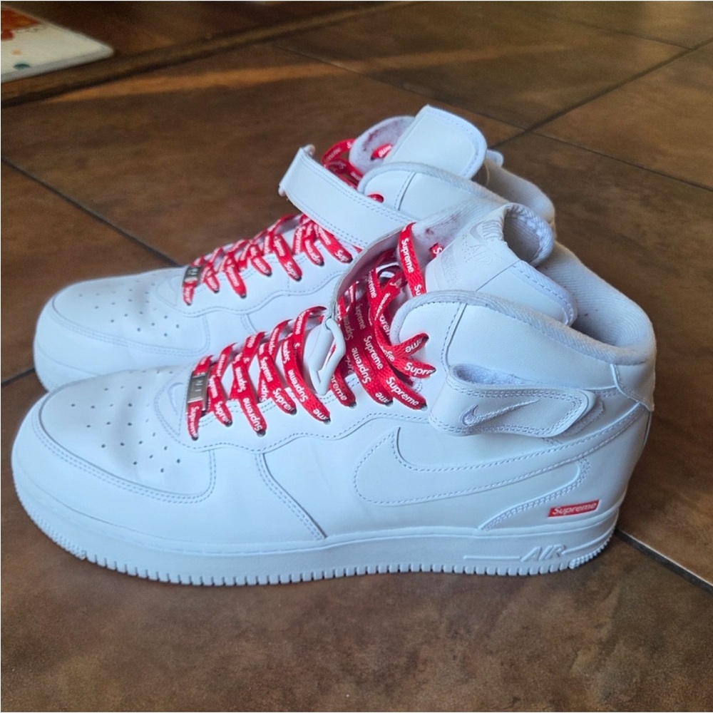 White High-Top Sneakers with Red Accents supreme Nike Air Force one